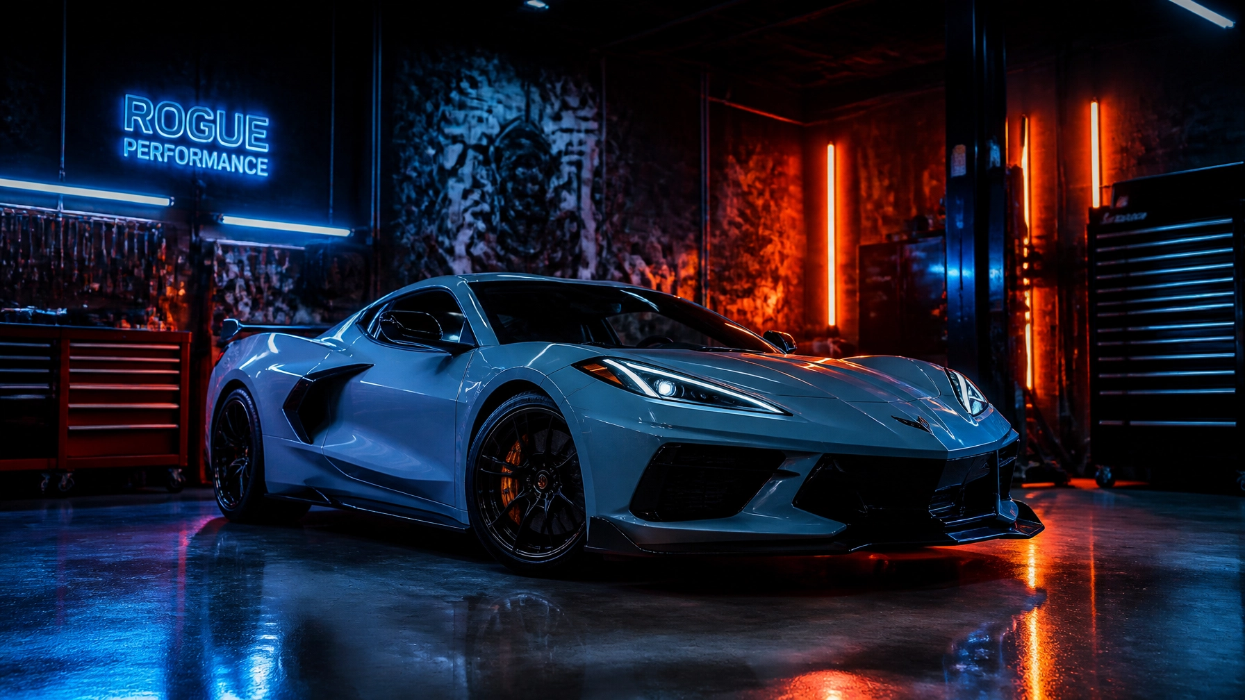 Blue Chevrolet Corvette in a neon-lit workshop with Rogue Performance sign.